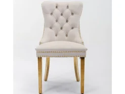 Cadeira de sala de jantar estofada com pés em aço inoxidável banhado a ouro, acabamento com tachas, revestimento em veludo, cor bege-dourado.