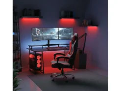 Cadeira gamer Legend com almofada lombar e apoio de cabeça em tecido preto e vermelho.