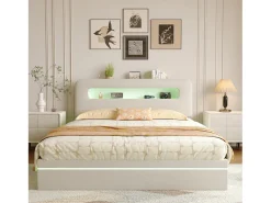 Cama de 140x200 cm em veludo bege com LEDs integrados, cabeceira com arrumação e sistema hidráulico.