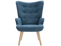 Poltrona em tecido azul acolchoado. Estilo escandinavo. VATELY