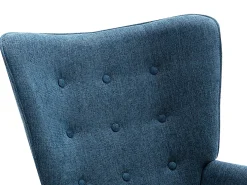 Poltrona em tecido azul acolchoado. Estilo escandinavo. VATELY