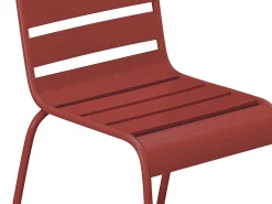 Sala de jantar de jardim em metal - 1 mesa D.110 cm e 4 cadeiras empilháveis Vermelhas