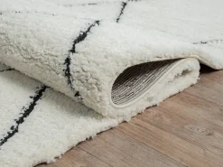 Tapete Bahar Shaggy moderno padrão losango, preto branco, 160 cm redondo